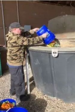 Adding items to compost bin